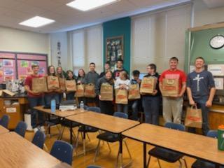 Pictures of students making the care packages.
